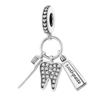 Charm Kit muela pasta y cepillo de dientes
